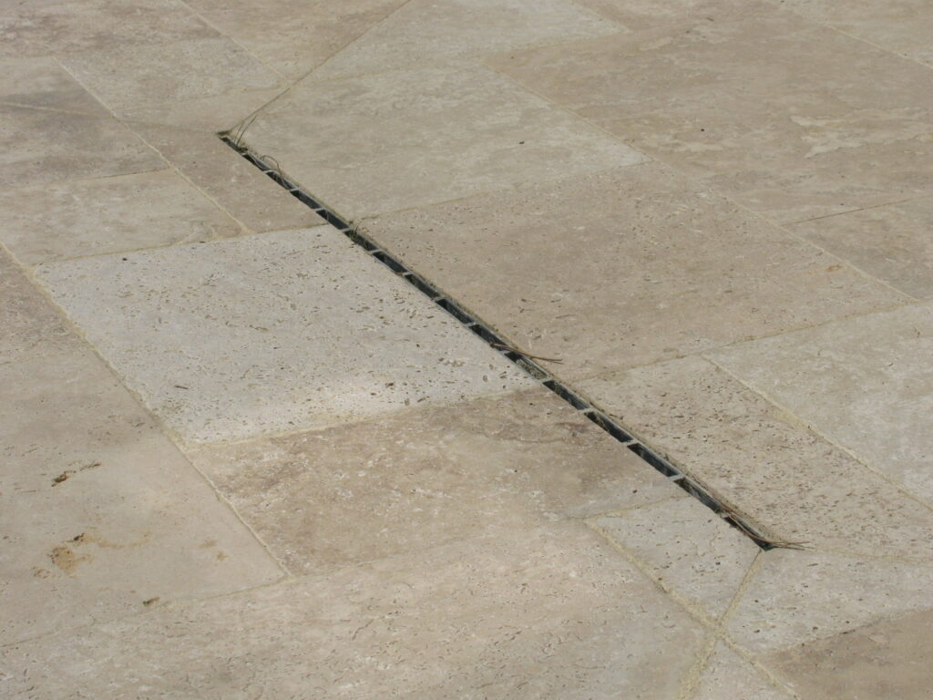terrasse - Évacuation des eaux de pluie dans le jardin